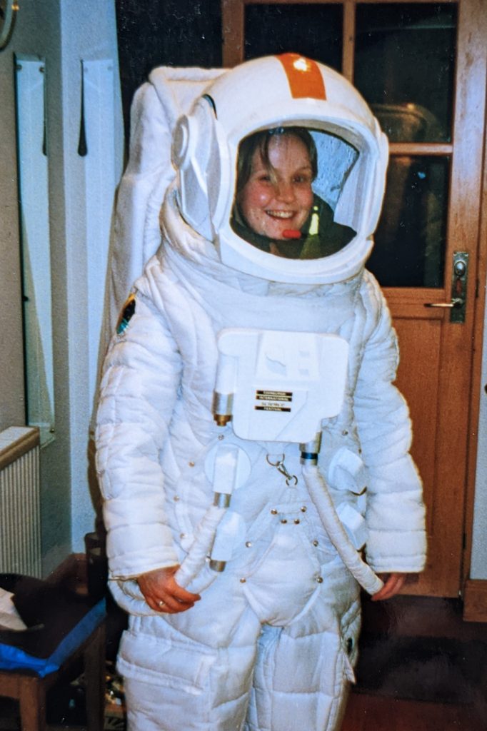 Sarah McLusky in a spacesuit