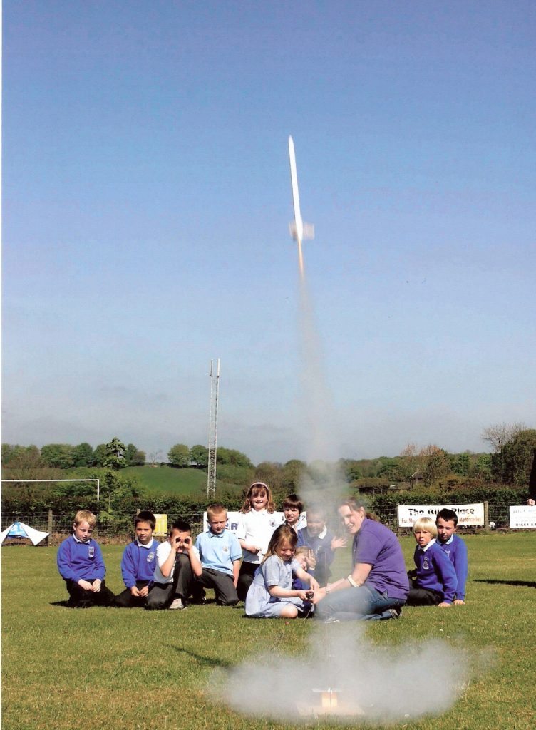 A group of children launching a rocket